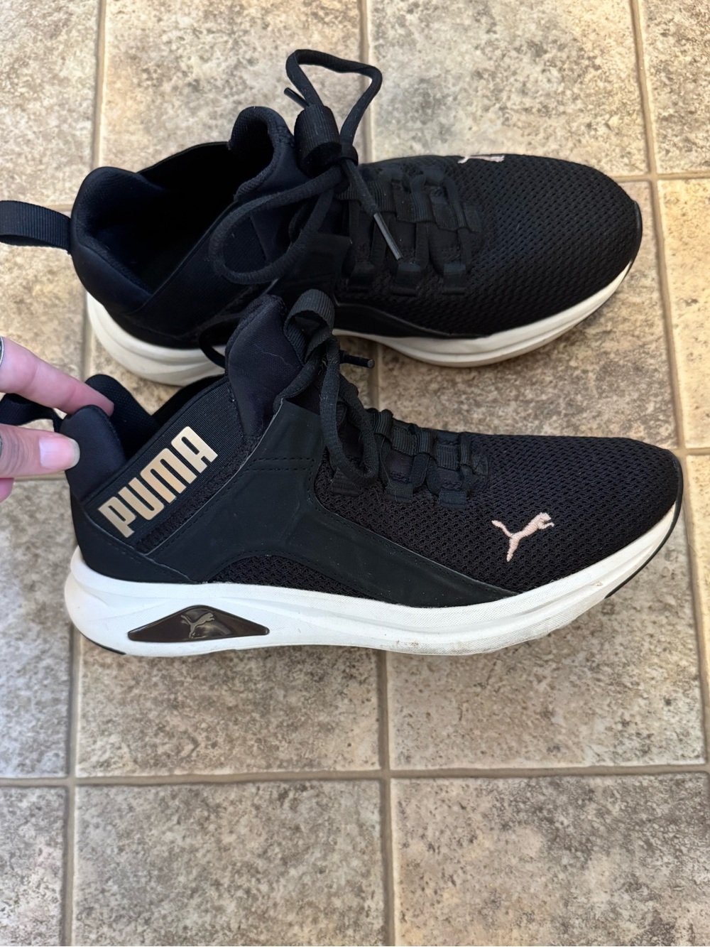 Puma Black Athletic Sneakers with White Sole and Gold Logo